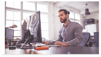 An employee working on his computer